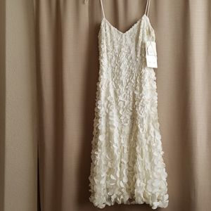 Winter white Petal dress by theia couture.